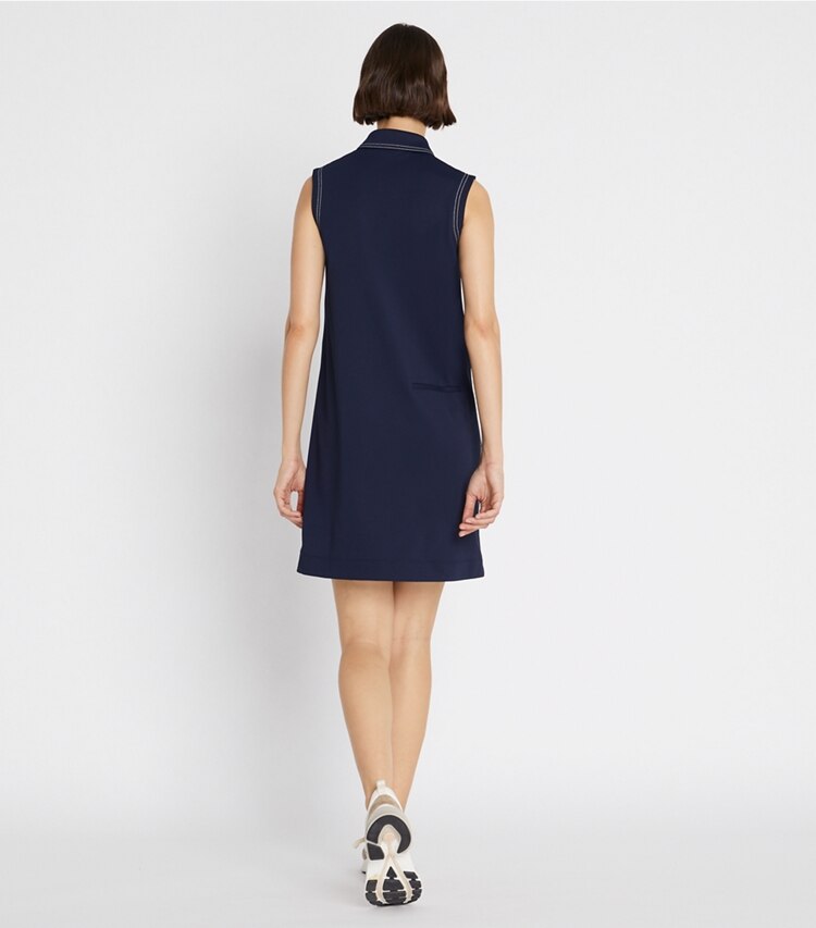 Tory Sport designer dresses Tech Piqué Pick Stitch Golf Dress in Tory Navy on model back